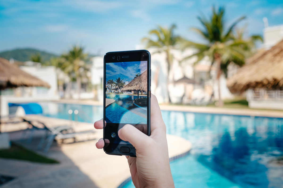 taking photo on smartphone on vacation
